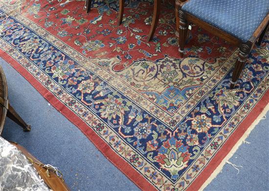 A Turkish carpet 330cm x 245cm